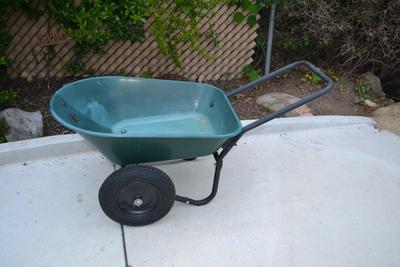 LOT 588. PLASTIC WHEELBARROW