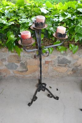 LOT 601. 41" TALL WROUGHT IRON CANDLE HOLDER