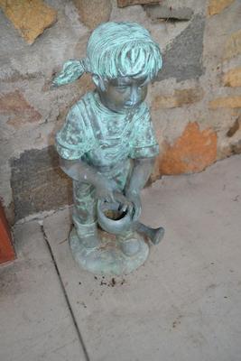 LOT 607.  GIRL WATER FIGURINE MADE OF METAL