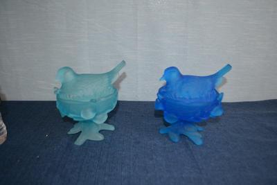 LOT 610. TWO GLASS COVERED BIRD SHAPED DISHES