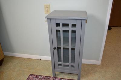 LOT 662:   CABINET AND FLOOR MAT (LOOK A LIKE SILK RUG)