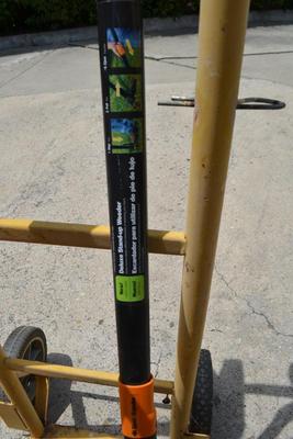 LOT 685. WEED REMOVER, DOLLY, WEED EATER, POWER CORD