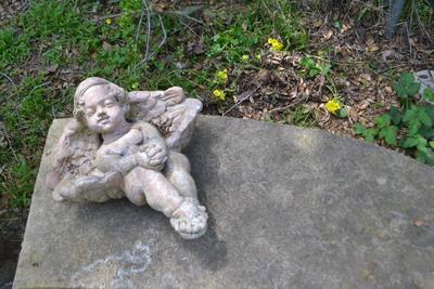 LOT 689. CONCRETE BENCH AND CONCRETE ANGEL
