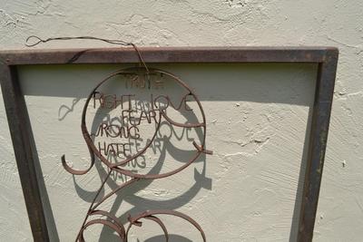 LOT 691. METAL YARD ART