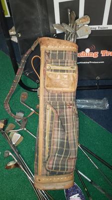 Bag of antique golf bags, some Spalding