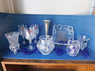 BEAUTIFUL ASSORTMENT OF LEAD CRYSTAL ITEMS, SOME BLUE MARBLES AND A TOUCH OF SILVER PLATE