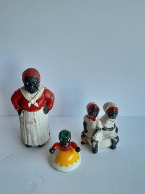 Cast Iron Mammy coin bank with porcelain figures, and metal bell
