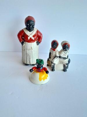 Cast Iron Mammy coin bank with porcelain figures, and metal bell