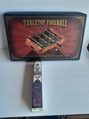 Tabletop Foosball game in the box and a Play anywhere Chess game, also new in the box