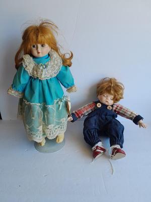 Two vintage porcelain dolls The Emerald Doll collection and a Heritage doll