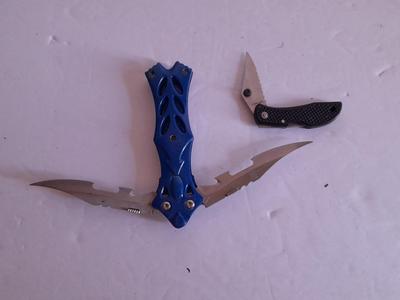 Two knives, double bladed and small black pocketknife