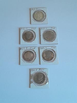 Six Kennedy Half Dollars 1964, 1983, 1984, 1985, 1986, and 1989