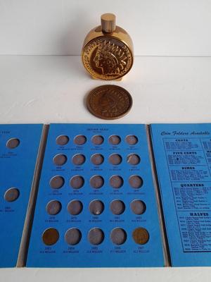 Indian head Penny Avon commemorative bottle, and large coin with Coin book and one Indian head penny