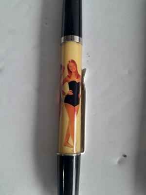 Vintage Swimsuit dropping pen, seduction book, and 1959 Ice Follies program booklet