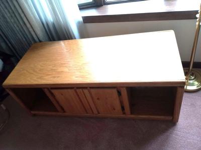 SOLID OAK COFFEE TABLE WITH A CABINET AND A FLOOR LAMP
