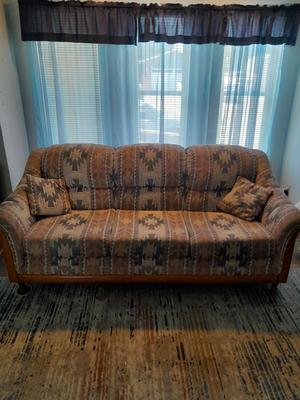 The Loren Mitchell Collection Southwestern style sofa with wood trim front