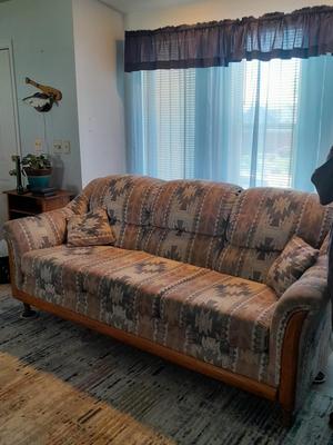 The Loren Mitchell Collection Southwestern style sofa with wood trim front