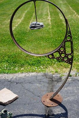 YARD ART METAL SCULPTURE IN THE PRAIRIE STYLE.