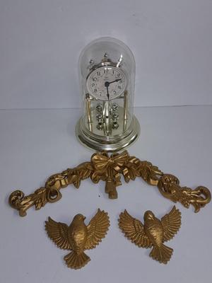 Elgin American Quartz Anniversary clock with globe, and MCM wall hangings