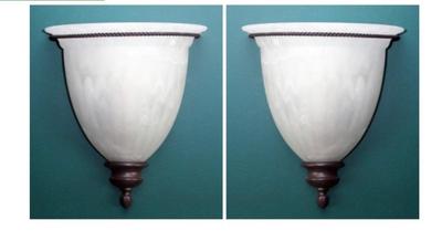 A Pair Of Glass Wall Sconces