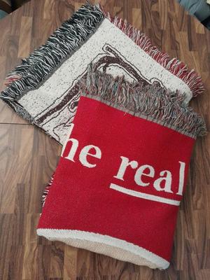 2 blankets, coco-cola and bible verse.