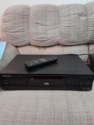 Pioneer DVD player with remote and four DVD movies