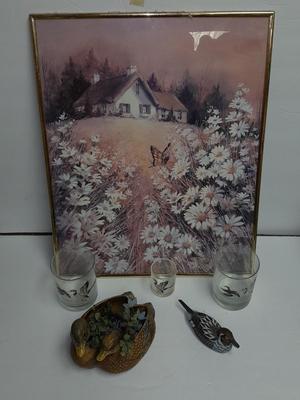 Country famed art work and duck decor.