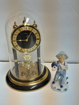 Condor Quartz anniversary clock with glass dome and small little boy blue figure