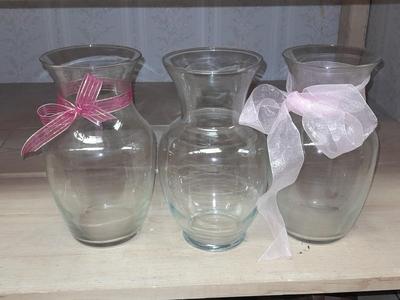 Three matching glass vases