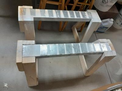 Two homemade short sawhorses with metal tops VERY sturdy and nice