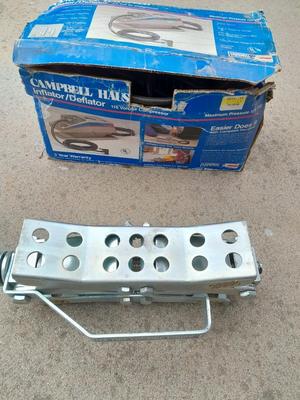 Campbell Hausfeld Inflater / decompressor 115 volt air compressor and a deluxe tire locking chock