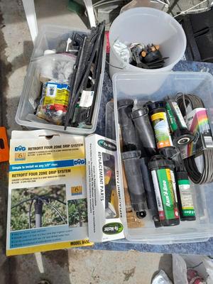 Rain Bird sprinkler heads, Drip line with attachments, and other watering / garden items
