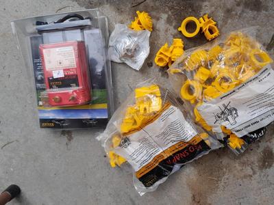 Red snapper electric fence charger with hardware