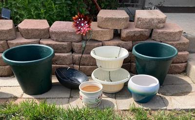 POTS or PLANTERS Whichever you would like them to be and a Flower
