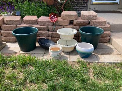POTS or PLANTERS Whichever you would like them to be and a Flower