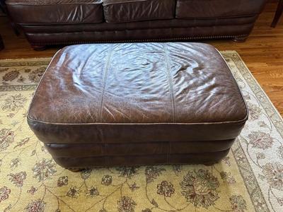 LEATHER OTTOMAN WITH NAILHEAD ACCENTS BY LANE FURNITURE