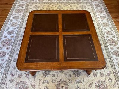 VERY NICE LEATHER TOP SQUARE COFFEE TABLE WITH A LARGE DRAWER