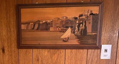 Wood inlay boat scene.