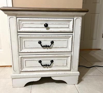 Realyn Three Drawer Nightstand