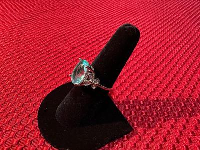 BEAUTIFUL STERLING SILVER RING WITH LIGHT BLUE STONE