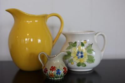 Two Pitchers and A Creamer