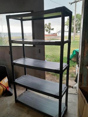 Tall black plastic Storage shelving unit