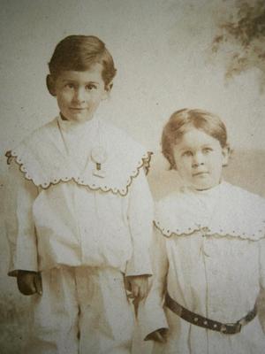 Early Image of Siblings in Matching Outfits