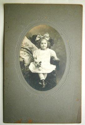 Early Image of young Girl with Roses