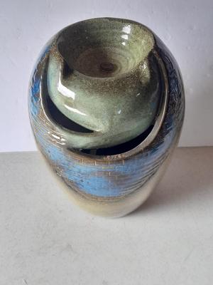 Beautiful pottery vase water feature with pump