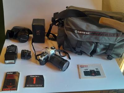 Pentax 35 mm camera Super Program Vivitar Series lens, Large Tamrac camera bag and MANY accessories