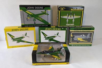 New In Box John Deere Airplane Replicas and Banks