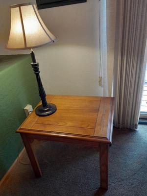 Wood side / End table with carved leaf design comes with black lamp
