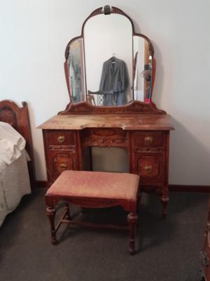 Antique wooden vanity with bench and mirror