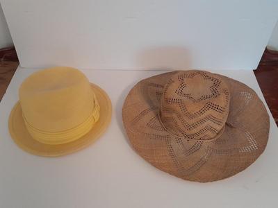 Two ladies' straw hats yellow hat is Union made